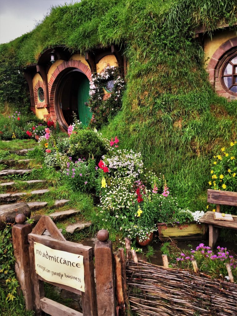 front entrance of bilbo baggins house and garden for post writing a fictional town