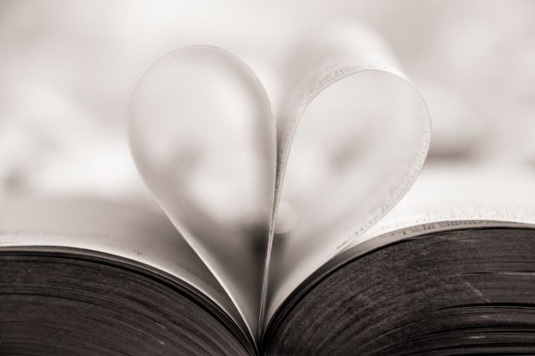 pages of a book in form of a heart for blog faqs how writing helps to heal