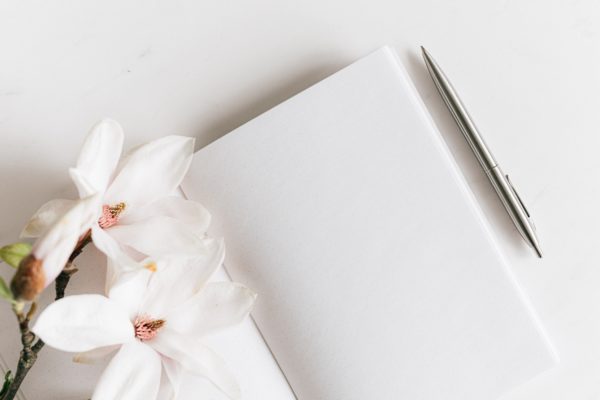 Notebook with flowers - Preparing Your Manuscript For Editing